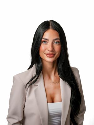 Portrait of Skylr Brickner, REALTOR®.